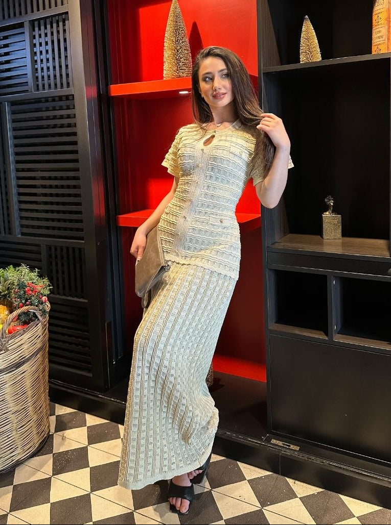 Beige Knitted dress with glitter and lining.