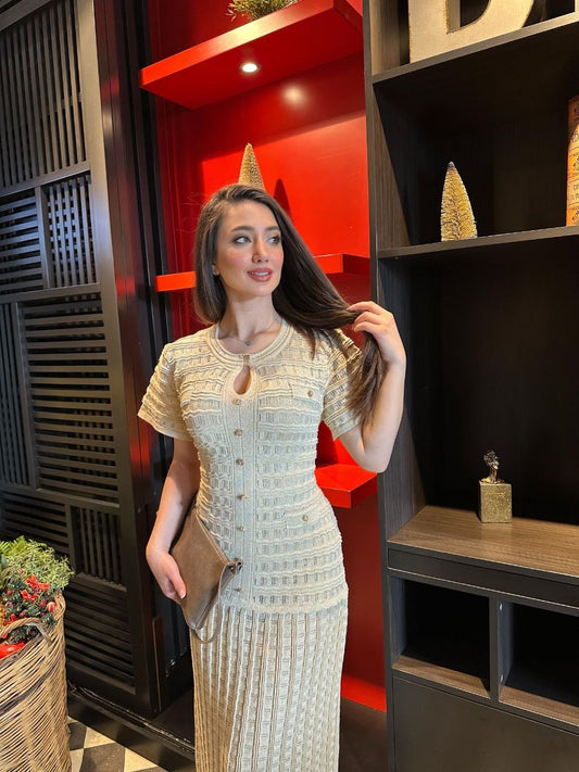 Beige Knitted dress with glitter and lining.
